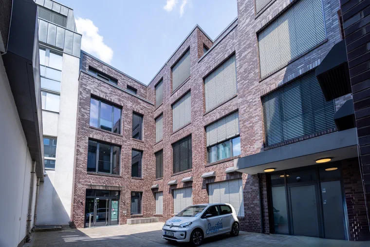 Neubau eines Wohn- und Geschäftshauses mit Arztpraxen